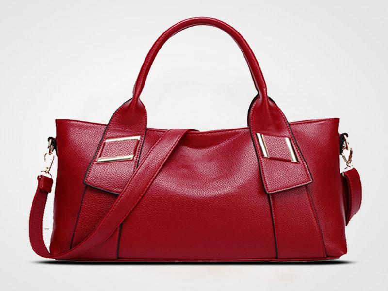 Stilvolle rote Damenhandtasche mit abnehmbarem Schulterriemen und modischem Design – ideal für den täglichen Gebrauch und besondere Anlässe.